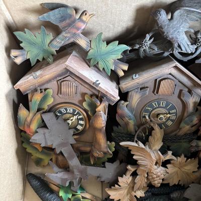 LOT 437: As Found Box of Cuckoo Clocks & Parts