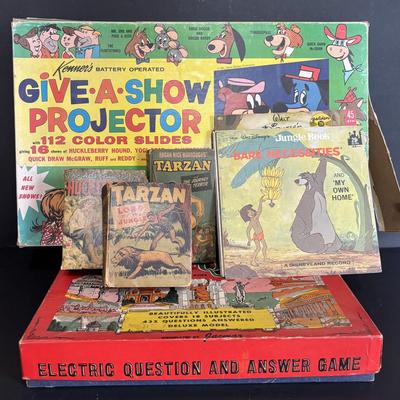 LOT 439: Vintage Kenner's Give a Show Projector, Electric EDU-QUIZ Vintage Educational Jacmar Game, 45 Jungle Book Records & More