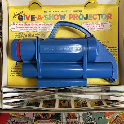 LOT 439: Vintage Kenner's Give a Show Projector, Electric EDU-QUIZ Vintage Educational Jacmar Game, 45 Jungle Book Records & More