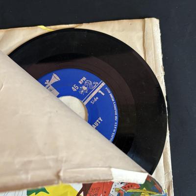 LOT 439: Vintage Kenner's Give a Show Projector, Electric EDU-QUIZ Vintage Educational Jacmar Game, 45 Jungle Book Records & More