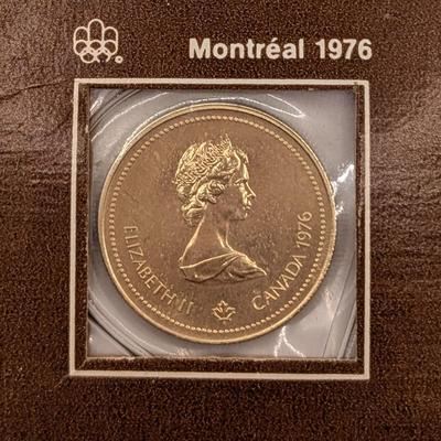 LOT: 480J Montreal 1976 Canadian Olympic 14K Gold, $100.00 Coin, (13.3g)