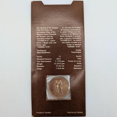 LOT: 480J Montreal 1976 Canadian Olympic 14K Gold, $100.00 Coin, (13.3g)