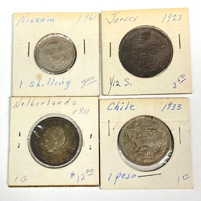LOT 535: International Coin / Token Collection - New Zealand, Costa Rica, Chile and More