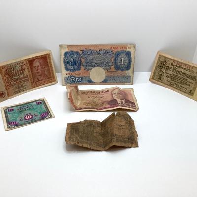 LOT 538: Large Collection of International Paper Currency