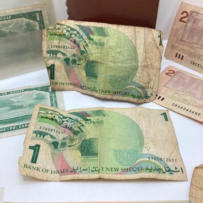 LOT 538: Large Collection of International Paper Currency