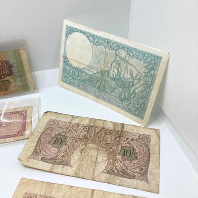 LOT 538: Large Collection of International Paper Currency