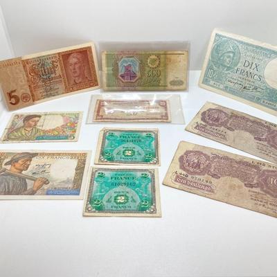 LOT 538: Large Collection of International Paper Currency