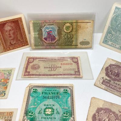 LOT 538: Large Collection of International Paper Currency