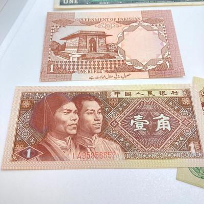 LOT 538: Large Collection of International Paper Currency