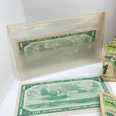 LOT 538: Large Collection of International Paper Currency