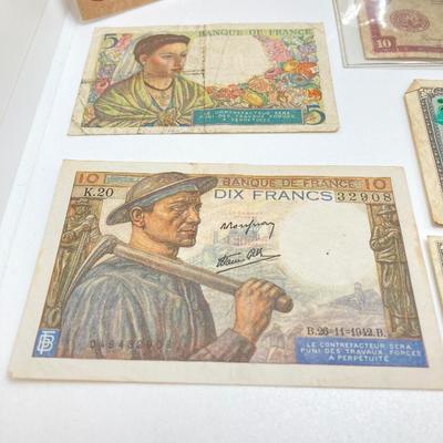 LOT 538: Large Collection of International Paper Currency