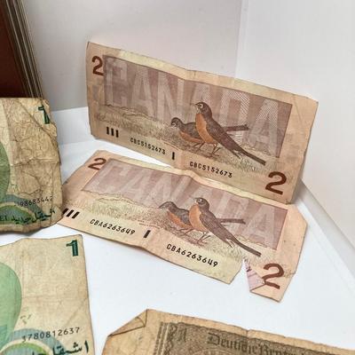 LOT 538: Large Collection of International Paper Currency