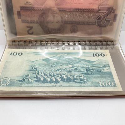 LOT 538: Large Collection of International Paper Currency