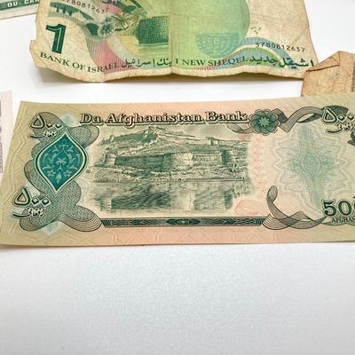 LOT 538: Large Collection of International Paper Currency