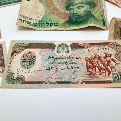 LOT 538: Large Collection of International Paper Currency