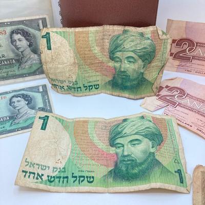 LOT 538: Large Collection of International Paper Currency