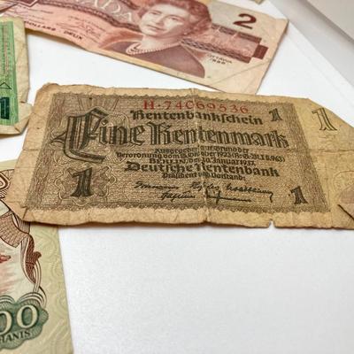 LOT 538: Large Collection of International Paper Currency