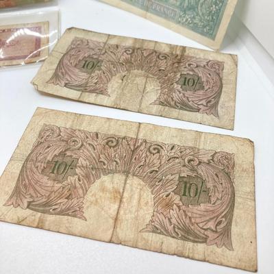 LOT 538: Large Collection of International Paper Currency