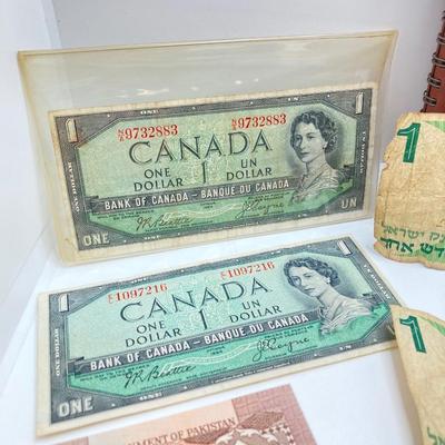 LOT 538: Large Collection of International Paper Currency