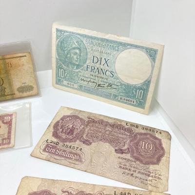 LOT 538: Large Collection of International Paper Currency