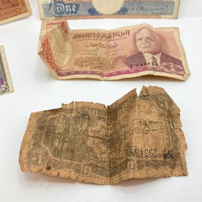 LOT 538: Large Collection of International Paper Currency