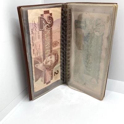 LOT 538: Large Collection of International Paper Currency