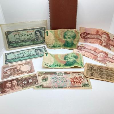 LOT 538: Large Collection of International Paper Currency
