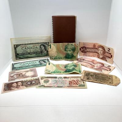 LOT 538: Large Collection of International Paper Currency