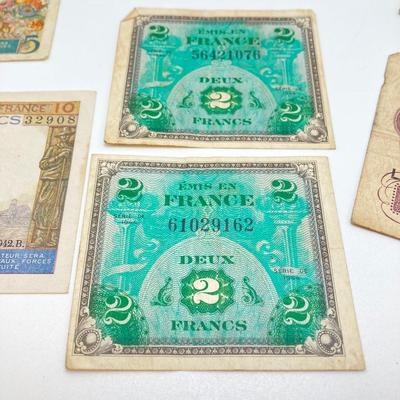 LOT 538: Large Collection of International Paper Currency