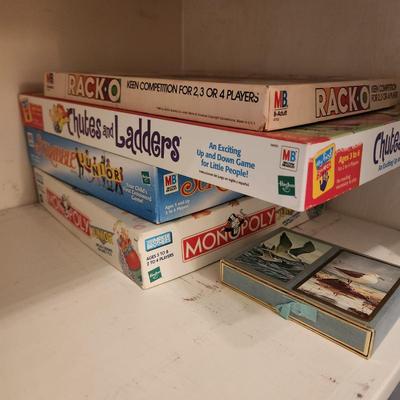 Large Lot of Puzzles , Games, Dominoes, Yahtzee, Trivial Pursuit, Uno, Playing Cards and more