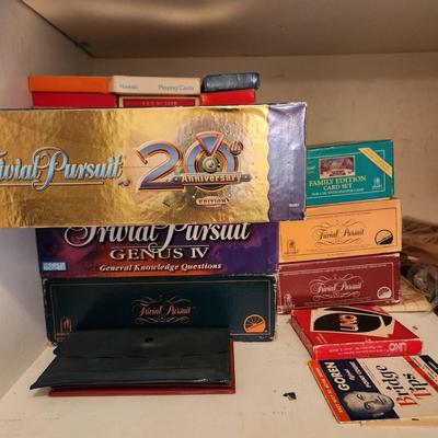 Large Lot of Puzzles , Games, Dominoes, Yahtzee, Trivial Pursuit, Uno, Playing Cards and more