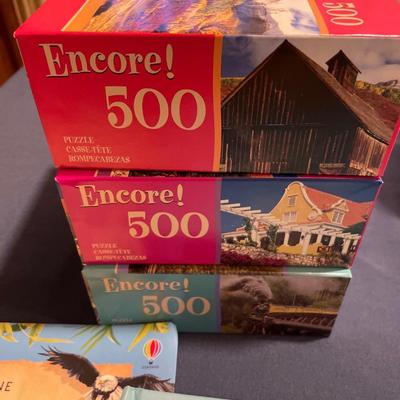 3 new puzzles and tote of kids books