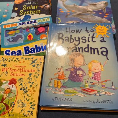 3 new puzzles and tote of kids books