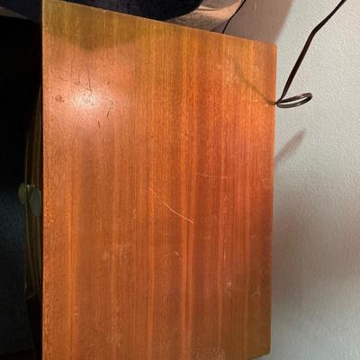 Vintage night stand with clock and lamp