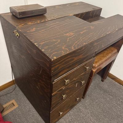 Antique sewing table with chair and alarm clock