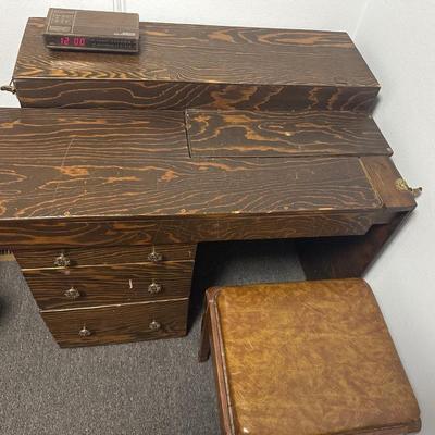 Antique sewing table with chair and alarm clock