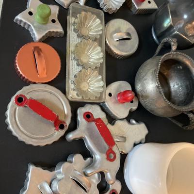 Silver plate, cookie cutters, honey can and plates