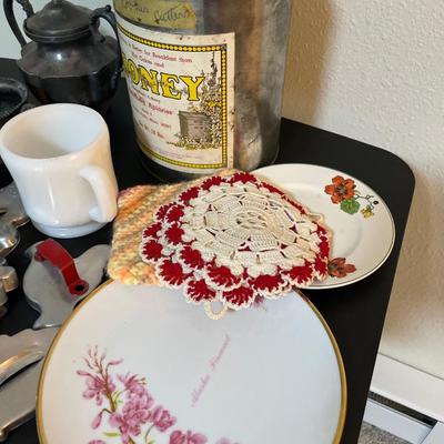 Silver plate, cookie cutters, honey can and plates