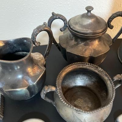 Silver plate, cookie cutters, honey can and plates