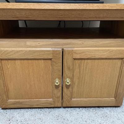 Sony TV on end table with Magnovox VHS/DVD