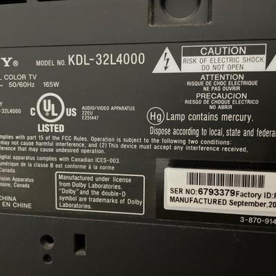 Sony TV on end table with Magnovox VHS/DVD