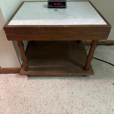 Vintage end table with alarm clock