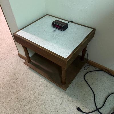 Vintage end table with alarm clock