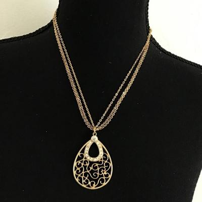 Multi chain, goldtone necklace with rhinestones and earrings