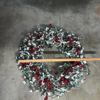 Large frosted tip wreath with electric lights