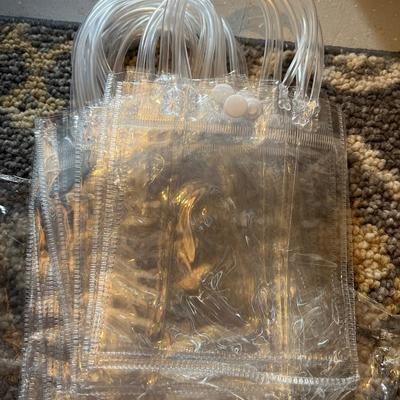Set of 9 new clear bags
