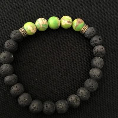 Beautiful Gaspeite and volcanic rock stone bead stretch bracelet