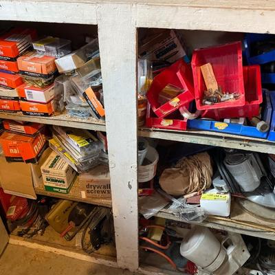 Bottom cabinet full of hardware & tools