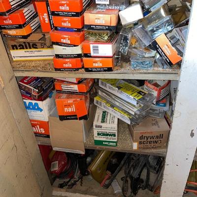 Bottom cabinet full of hardware & tools