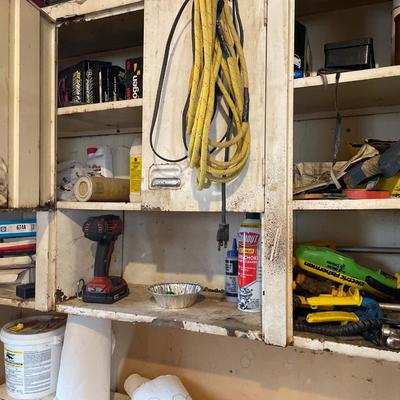 Top cabinet full of items